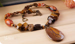 Load image into Gallery viewer, bhavaa Premium Gemstone Jewelry- Necklace. Rustic Elegance Collection, Mark-1 | Gemstones: Tiger Eye, Tiger Eye Faceted, Orange Crab Agate Faceted, Orange Dragon Veins Agate
